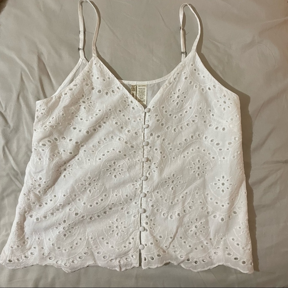 White eyelet pattern tank top.